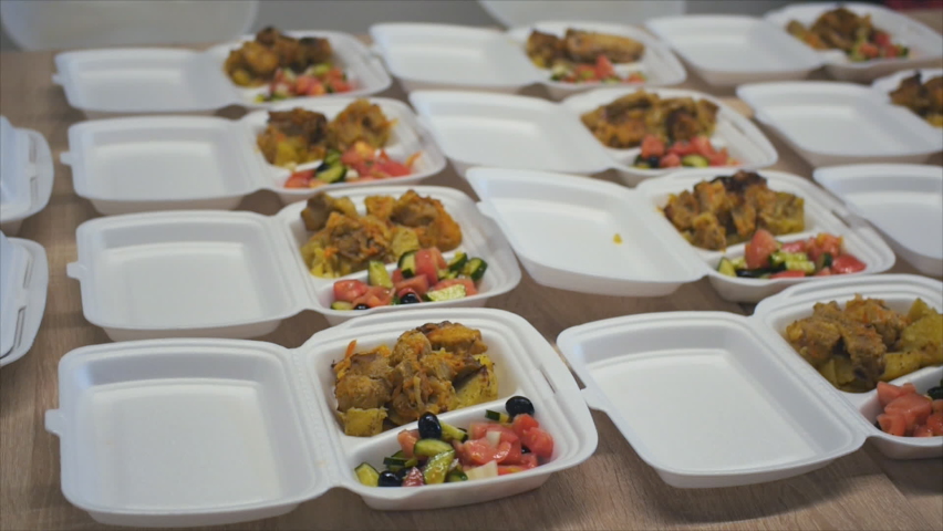 View of served plastic containers with take away meals | Shutterstock HD Video #1073433086
