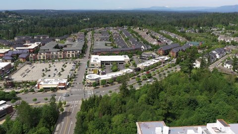 Cinematic drone panning clip of the Issaquah, Issaquah Commons and Issaquah Highlands commercial and shopping area, in King County Washington, near Seattle and Bellevue in Western Washington