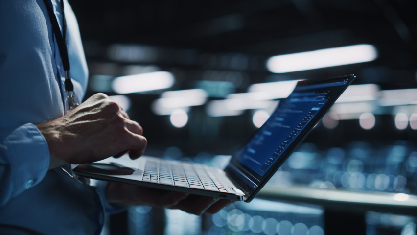 Data Center Programmer Using Digital Laptop Computer, Maintenance IT Specialist. Cloud Computing Server Farm System Administrator Working on Cyber Security for Iaas, saas, paas. Closeup Focus on Hands Royalty-Free Stock Footage #1073440169