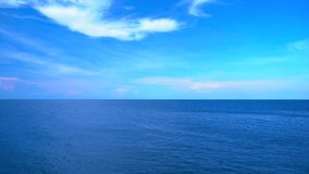 4K UHD. Beautiful tropical blue ocean landscape. Phuket is a tourist destination and famous landmarks in Thailand. Landscape view of beach sea sand and sky in summer day. Beach space area. Video Clip.