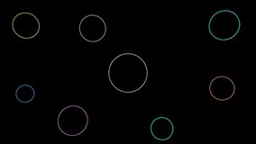 4K video animation of colorful circles moving up and down on the black background.