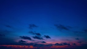 4K Time lapse of Majestic sunset or sunrise landscape Amazing light of nature cloudscape sky and Clouds moving away rolling 4k colorful dark sunset clouds Footage timelapse on May 29,2021
