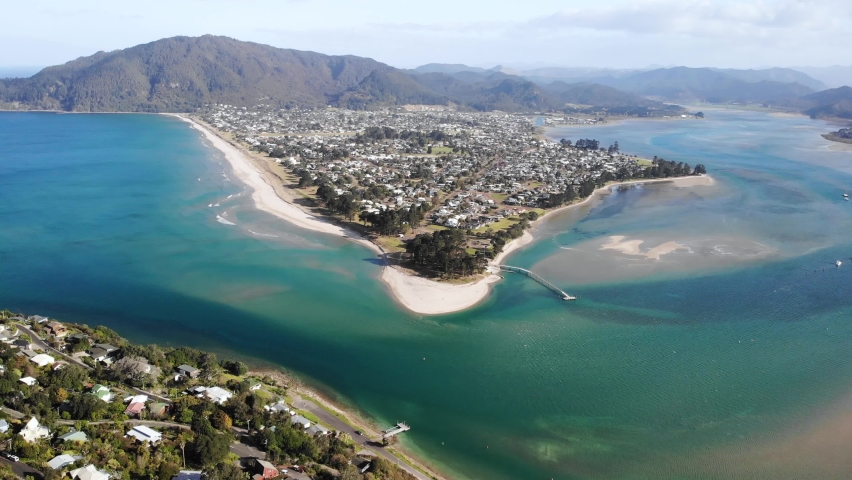 New Zealand Coastline. Aerial View of Beautiful Beach Resort Peninsula on Sunny Day. Pauanui, Coromandel, North Island, Drone Shot Royalty-Free Stock Footage #1073454713
