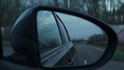 4K 60p Side Mirror View. Empty Highway Expressway Suburban Road. Coronavirus Lock-down Quarantine. Travelling by Car POV. France Europe.