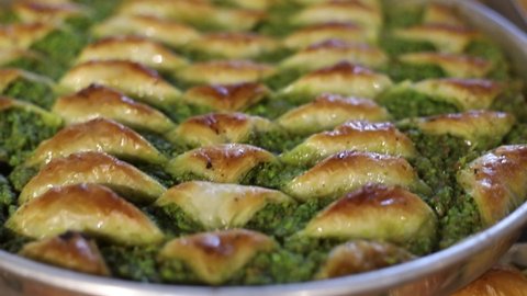 The view of Gaziantep's famous pistachio baklava on trays at the restaurant