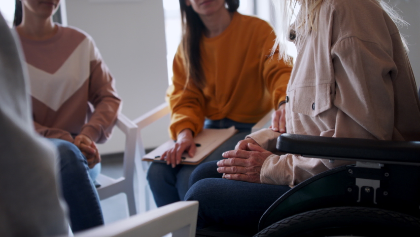 Group of people on therapy session, members holding each other by hand. Royalty-Free Stock Footage #1073465501