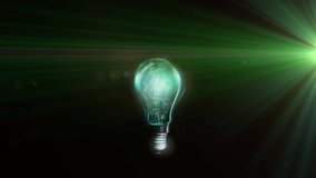 Animation of lit light bulb with green glowing light and copy space. global science, ideas and research concept digitally generated video.
