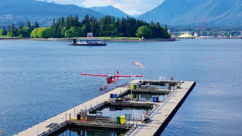 A seaplane parked and docked at the Coal Harbour, Vancouver, Canada, May 2021
