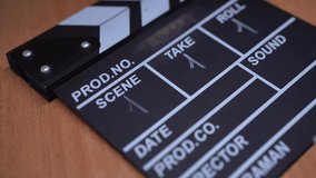 Clapperboard on set. Movie production. Cinema stage. Clapper write number of scene on the