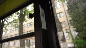 Close up of female hand scanning qr code with smartphone to pay bus fare - Powered by Shutterstock - Get 15% off with code: PIKWIZARD15