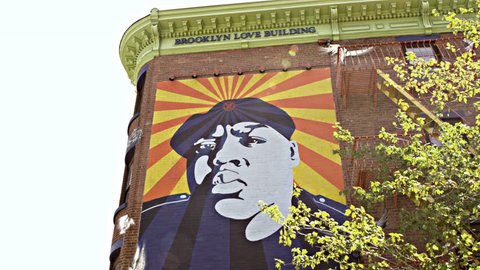 NEW YORK - JULY 3, 2015: Fort Greene subway station with famous mural of Biggie Smalls in 4K, BK, NY. Notorious BIG was a famous rapper from Brooklyn, NYC.