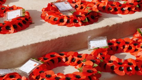 LONDON, circa 2020 - The Armistice Day is Commemorated in the UK. Many poppy wreaths from several countries are laid on the Cenotaph, a war memorial on Whitehall in London, England.