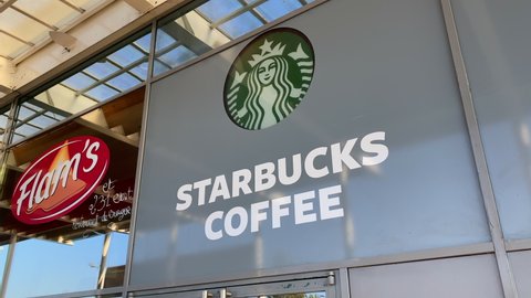 Bordeaux, France - May 2021 : Starbucks Coffee logo on the front of the coffeehouse