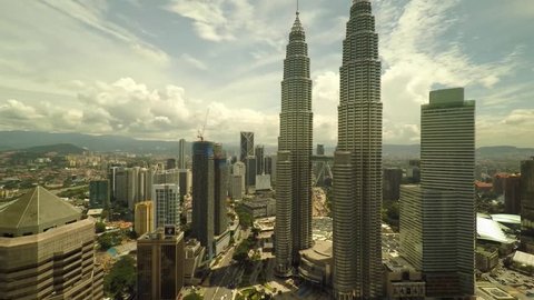 Kuala Lumpur, Malaysia, November 2014 - Aerial view of KL City, Petronas Twin Tower. Camera angle hovering from bottom to top. 1080p Resolution. Kuala Lumpur, Malaysia 