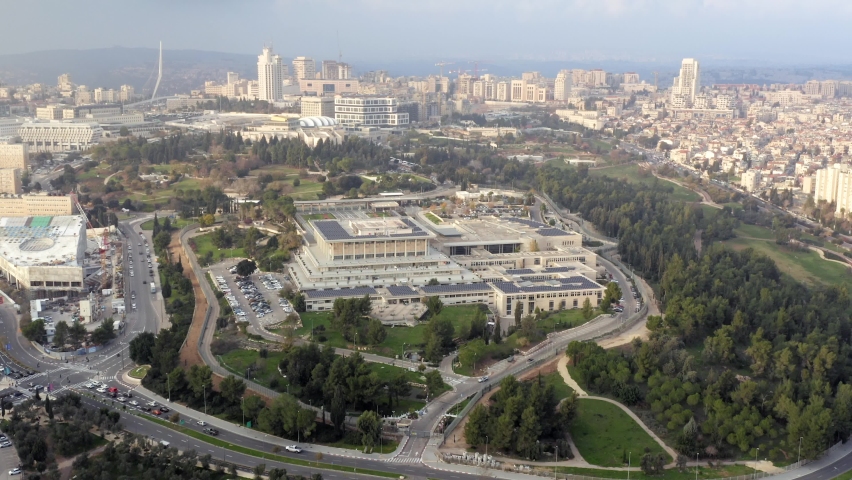Aerial view of the Knesset, The Israeli house of Parliament, located in Jerusalem, with city rooftops in the horizon.