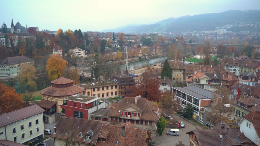 Pan over Neuchatel in Switzerland on cold misty morning.