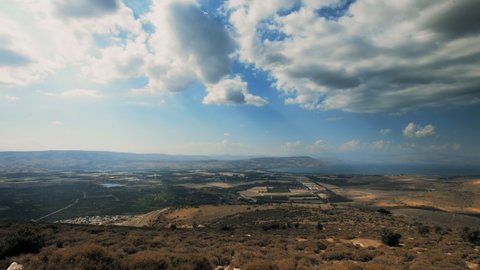 The Sea of Galilee, Lake of Gennesaret. Lake Tiberias. Golan Heights. Awesome landscape, Wide pan right shot for Sea of Galilee with Golan Heights and Agriculture Farms. 4k footage