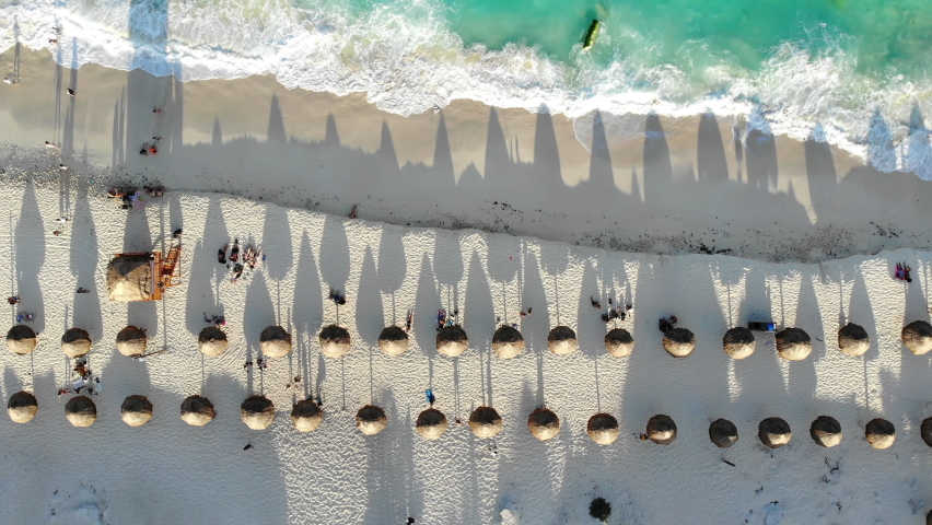 Aerial top view of Playa Delfines, a famous public beach in Cancun, Quintana Roo, Mexico