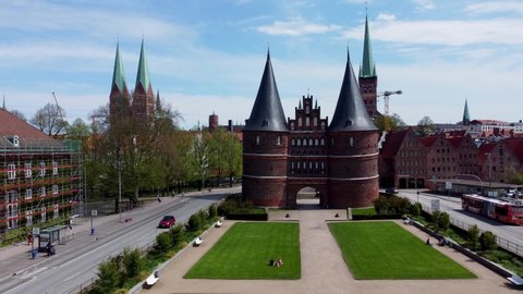 Famous Holstentor in the city of Lubeck Germany - aerial photography - CITY OF HAMBURG, GERMANY - MAY 10, 2021