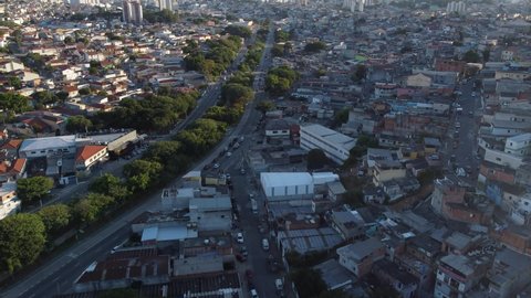 cinematic Aerial View of houses, slum são paulo, brazil. cachoeirinha. Poverty, population, city on sunset 