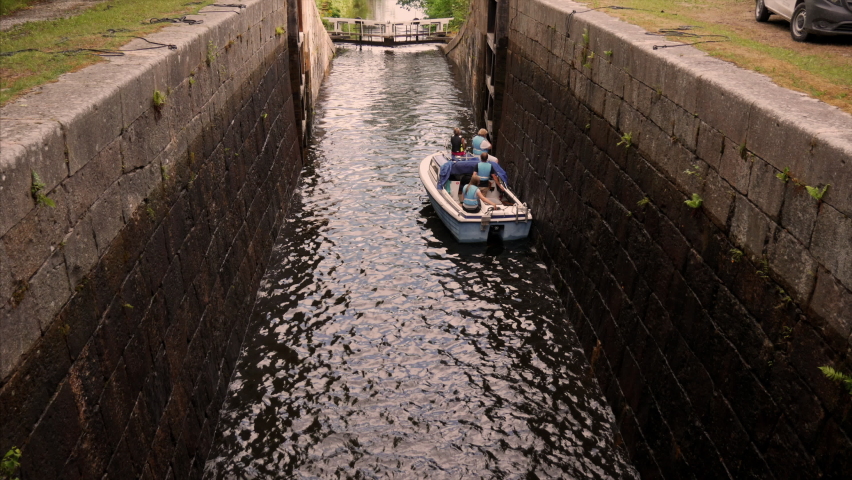Boat leaving pound lock and enter the next one