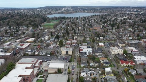 Cinematic aerial drone footage of Wallingford, Freemont, Meridian, Green Lake, Phinney Ridge, Northlake, Lake Union, residential Seattle neighborhoods near downtown Seattle, Washington