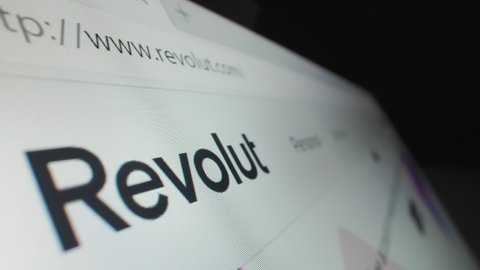 Melbourne, Australia - Jun 3, 2021: Motorized moving shot of Revolut logo on its website, shot with macro probe lens. It is one of the largest digital bank in the UK