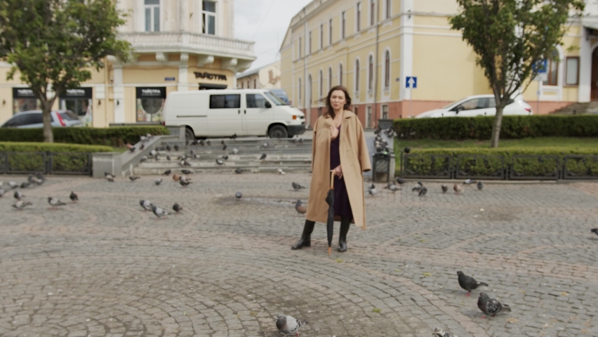 focusing on the gorgeous eyes of a young woman around whom life is booming