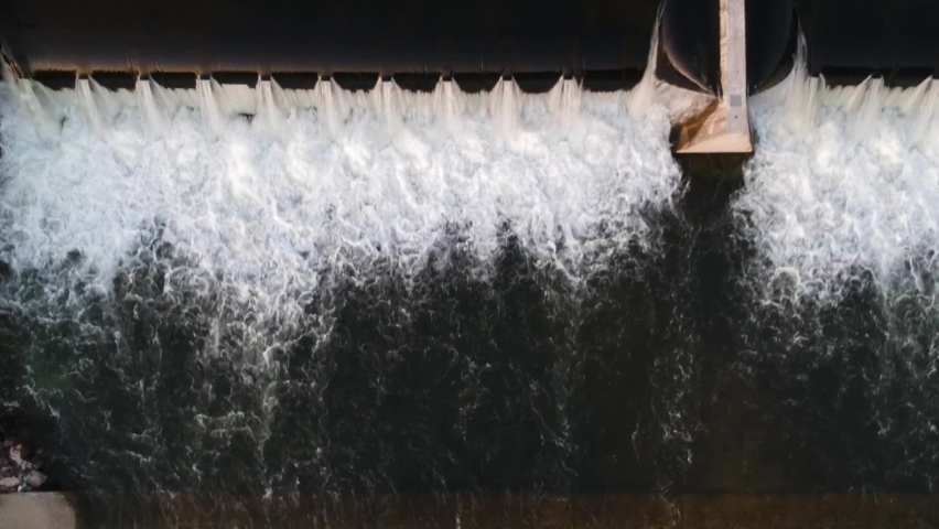 Flowing Water Water Mill Waterfall at Hydroelectric Electric Power Plant, Aerial Top Down