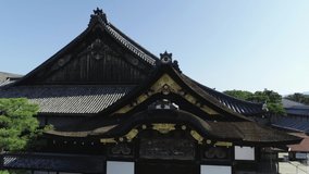 Drone video showing the beauty of the roof of Nijojo Castle's Ninomaru Palace