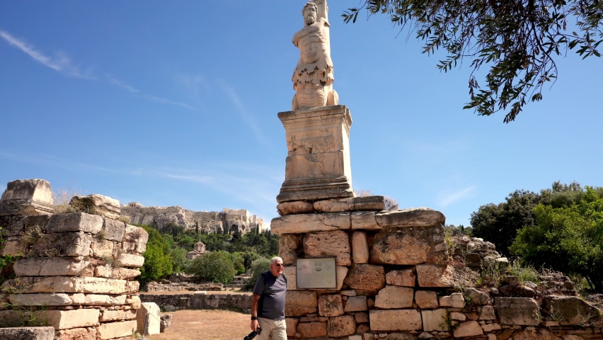 Athens Greece 05 19 2021: Tourist at     Odeon of Agrippa  in the centre of the Ancient Agora of Athens
