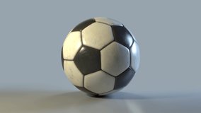 Side on view of a 3D soccer ball rolling from right to left. Standard football in a continuous roll perfect for sports advertising. 4K clip at 30fps for smooth motion with a luma matte.