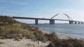 Bridge across Fehmarn Sound at the Baltic Sea, 4k video footage