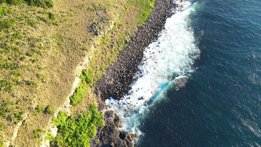 Beautiful Landscape With The Basalt Rocks At The Shore Of Cook Island In Australia. aerial