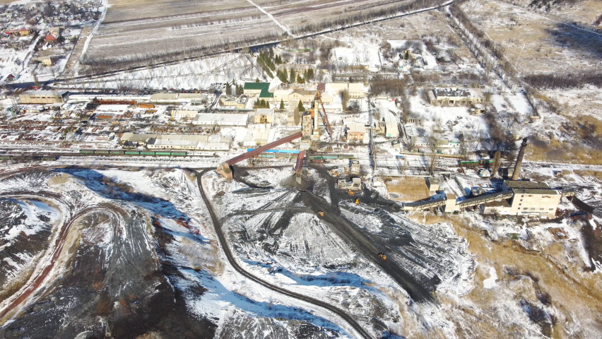 Aerial shot of plant or factory for fossil extraction. Environment pollution problem. Industry and manufacture concept. Top view