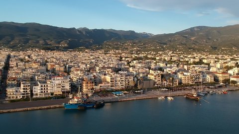 Aerial seaside view over Kalamata city in Messinia, Greece at sunset