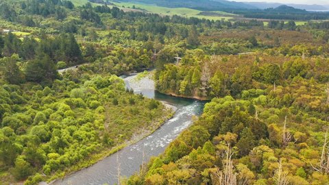 Taupo , Waikato , New Zealand - 08 10 2018: Tongariro River, water coming from Mt Ruapehu, near turangi. Rafting river drone view