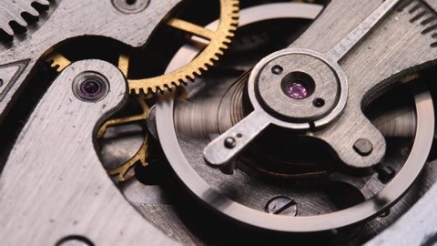 Mechanical watches with gears and cogs. Watch or clock mechanism. Time or work concept. Clockwork details and parts