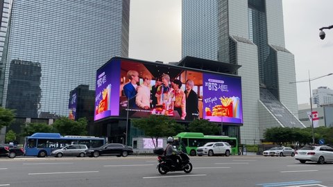 Seoul, South Korea - June 1 2021: McDonald's the BTS Meal Ad on Coex digital billboard at Gangnam. K-pop artist BTS has created the meal with the fast-food giant.