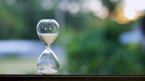 Green natural light hourglass background video footage