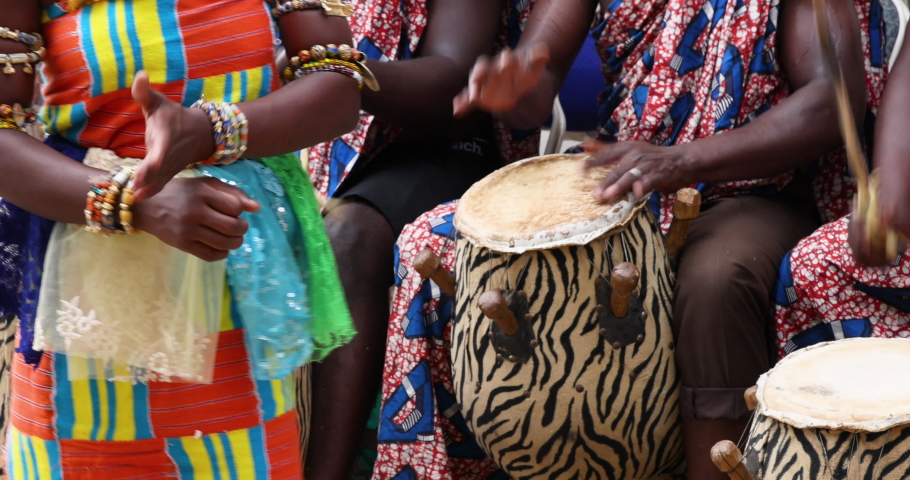 Traditional Ashanti dance cultural Kumasi Ghana. Traditional cultural music instruments, drums, for dancing and entertainment. Culture African celebration demonstration. Typical dance, dress and color Royalty-Free Stock Footage #1073643188