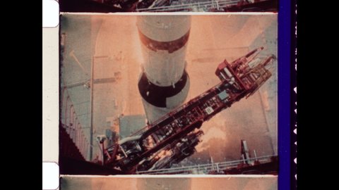 July 20th 1969. Chunks of Ice fall from Apollo 11 Rocket as the Spacecraft Launches from Launch Pad. Ultra Slow Motion, 1000 fps of Rocket Take Off. 4K Overscan of Vintage Archival 16mm Film Print