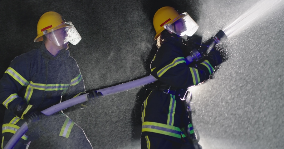 night shift of firefighters extinguishing the blaze