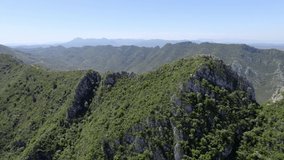Drone flying over a mountain at May (spring) in La Murta mountain (Valencia, Spain).