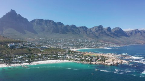 Aerial view. Shoreline of Camps Bay, Cape Town, South Africa, with Twelve Apostles mountains. CAPE TOWN, SOUTH AFRICA.