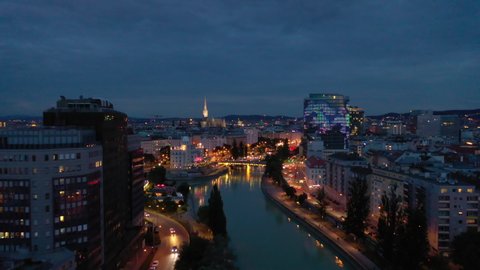 twilight time illumination vienna city famous riverside night life traffic bridge aerial panorama 4k austria