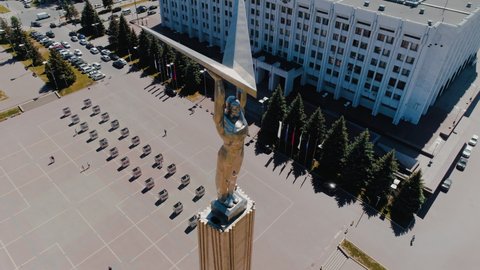 Monument of Glory on the banks of the Volga river. Aerial view of Samara city in sunny day.Samara Russia 27.05.2021