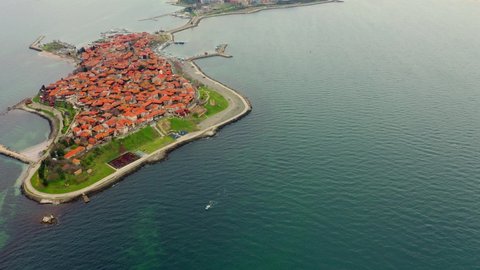 4k drone flight moving to the side footage (Ultra High Definition) of old town of Nessebar. Stunning spring seascape of Black sea, Bulgaria, Europe.