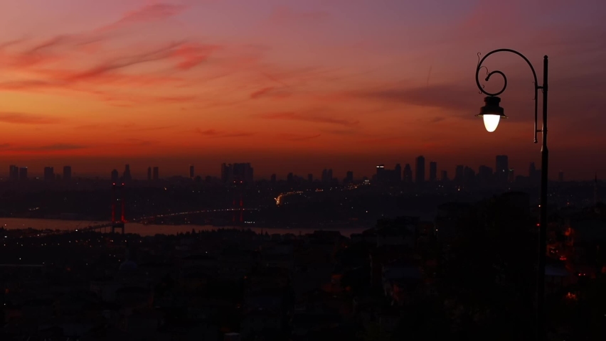 Night view from the Bosphorus to the facades of historical buildings in the city of Istanbul. On the streets of the city in public places.