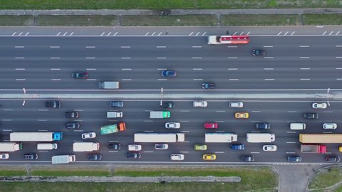 Large traffic jam on the motorway on a summer day. aerial view